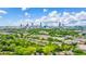 Breathtaking aerial view of the city skyline surrounded by lush greenery, showcasing the vibrant urban environment at 185 Elizabeth St, Atlanta, GA 30307