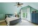 Serene bedroom with a vaulted ceiling, hardwood floors, and a calming view of the outdoors at 185 Elizabeth St, Atlanta, GA 30307