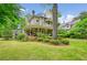 Lovely home with a sprawling front lawn and a charming wrap-around porch at 185 Elizabeth St, Atlanta, GA 30307