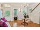 Elegant foyer featuring staircase, chandelier, stained glass, and hardwood floors at 185 Elizabeth St, Atlanta, GA 30307