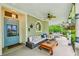 Relaxing front porch area with cozy seating, ceiling fan, and stylish decor at 185 Elizabeth St, Atlanta, GA 30307
