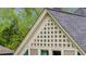Detailed gable of a home featuring a decorative pattern and trim, adding architectural interest and charm at 185 Elizabeth St, Atlanta, GA 30307