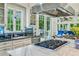 Well-lit kitchen boasting granite countertops, a stainless steel range hood, and outdoor views at 185 Elizabeth St, Atlanta, GA 30307