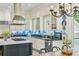 Chef's kitchen featuring ample countertop space, a gas cooktop, and blue tile accents at 185 Elizabeth St, Atlanta, GA 30307