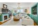 Living room showcasing a fireplace, built-in bar, and comfortable seating at 185 Elizabeth St, Atlanta, GA 30307