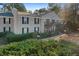 Apartment building featuring balconies and green landscaping at 3486 Essex Ave # 88, Atlanta, GA 30339