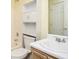 Bathroom featuring a toilet, bathtub, a vanity with ample storage, and a large mirror above the sink at 4157 Lake Mist Nw Dr, Kennesaw, GA 30144