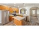 Contemporary kitchen with stainless steel appliances, island, and open layout at 6053 Park Close, Fairburn, GA 30213