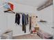 Functional walk-in closet with wire shelving provides ample storage and organization for clothing and accessories at 2341 Lily Valley Dr, Lawrenceville, GA 30045