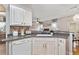 Well-equipped kitchen with light wood cabinets, modern countertops, and a full sink at 2341 Lily Valley Dr, Lawrenceville, GA 30045