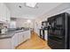 Spacious kitchen with stainless steel appliances, wood floors, and plenty of cabinet space at 2341 Lily Valley Dr, Lawrenceville, GA 30045