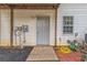 Property with exterior door, vinyl siding, meter box, and lawn equipment visible at 285 Enterprise Path, Hiram, GA 30141