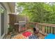 Charming deck area with grill, chiminea, and colorful outdoor rug, ideal for entertaining at 285 Enterprise Path, Hiram, GA 30141