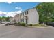 Inviting two-story home with white siding, black shutters, and manicured landscaping at 285 Enterprise Path, Hiram, GA 30141