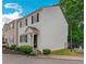 This is a two-story home with white siding, black shutters, and tidy landscaping at 285 Enterprise Path, Hiram, GA 30141