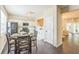 Bright kitchen with stainless steel appliances, white cabinets, and dark wood floors at 285 Enterprise Path, Hiram, GA 30141