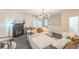 A stylish living room with a fireplace, modern lighting, and a comfortable sectional sofa at 285 Enterprise Path, Hiram, GA 30141