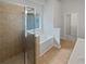 Bright bathroom with a separate shower and tub and a window at 403 Vinings Vintage Cir, Mableton, GA 30126