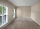 Bedroom with neutral colored walls and carpet at 403 Vinings Vintage Cir, Mableton, GA 30126