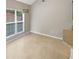 Dining area with light tan tile floors and decorative lighting fixture at 403 Vinings Vintage Cir, Mableton, GA 30126