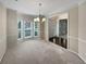Formal dining room with large windows at 403 Vinings Vintage Cir, Mableton, GA 30126