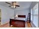 Bedroom featuring hardwood floors, and natural light from a window at 6118 Queen Anne Ct, Norcross, GA 30093
