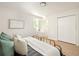 Bright bedroom featuring a closet, wood floors, and ample sunlight at 2834 Vicksburg Ct, Decatur, GA 30034