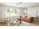 Bright living room with large window, contemporary furnishings, and neutral decor at 2834 Vicksburg Ct, Decatur, GA 30034
