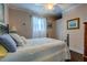 Bedroom featuring a white bedspread and sheer curtains at 455 Mayo Rd, Covington, GA 30014