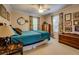 Bedroom with floral curtains, bed and hardwood floors at 455 Mayo Rd, Covington, GA 30014
