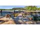Lakefront property featuring a private boat dock with covered slip, providing convenient water access and scenic views at 455 Mayo Rd, Covington, GA 30014