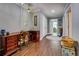 Hallway with hardwood floors, a writing desk, and access to multiple rooms at 455 Mayo Rd, Covington, GA 30014
