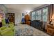 Inviting living room with natural light, hardwood floors, and cozy furnishings at 455 Mayo Rd, Covington, GA 30014