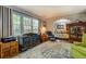 Bright and airy living room with a large window and classic furnishings at 455 Mayo Rd, Covington, GA 30014