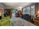 Inviting living room with natural light, hardwood floors, and cozy furnishings at 455 Mayo Rd, Covington, GA 30014