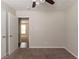 Bedroom featuring neutral carpeting and decor, and natural lighting at 5326 Rocky Pine Dr, Lithonia, GA 30038
