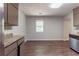 Spacious kitchen offers stainless steel appliances, ample countertop space, and bright natural light at 5326 Rocky Pine Dr, Lithonia, GA 30038
