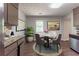 Cozy kitchen features stainless steel appliances, granite counters, and a breakfast area at 5326 Rocky Pine Dr, Lithonia, GA 30038