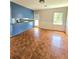 Dining area with hardwood flooring and bright natural light at 589 Catrina Ct, Stone Mountain, GA 30087