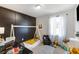 Playful bedroom with unique decor, ample natural light, and cozy reading nook at 379 Villa Rosa Way, Temple, GA 30179