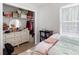 Bedroom features a closet, a window for natural light, and carpet flooring at 379 Villa Rosa Way, Temple, GA 30179