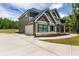 Stylish two-story home with a convenient attached garage and beautifully landscaped front yard at 415 Paynes Lake Rd, Carrollton, GA 30116
