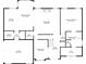 Floor plan displaying the first floor layout, including kitchen, living room, primary bedroom, and garage at 415 Paynes Lake Rd, Carrollton, GA 30116