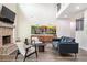 Inviting living room showcasing a brick fireplace, soaring ceiling, and contemporary decor for a cozy atmosphere at 415 Paynes Lake Rd, Carrollton, GA 30116