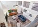 Overhead view of the living room, featuring a two-story ceiling, wood floors, and an attached loft at 415 Paynes Lake Rd, Carrollton, GA 30116