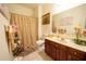 Bathroom with single vanity, neutral tiling and a bathtub/shower combo at 4734 Eagles Ridge Loop, Lithonia, GA 30038