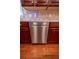 Featuring a stainless-steel dishwasher alongside beautiful cabinetry, countertop, and hardwood flooring at 4734 Eagles Ridge Loop, Lithonia, GA 30038
