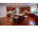 Gourmet kitchen island with seating, stainless appliances, and beautiful wood cabinetry at 4734 Eagles Ridge Loop, Lithonia, GA 30038
