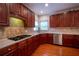 Well-appointed kitchen with modern appliances, granite countertops, and ample cabinet space at 4734 Eagles Ridge Loop, Lithonia, GA 30038