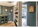 Basement built-in display shelves with collectibles, offering a unique touch at 745 Devon Hill Ct, Roswell, GA 30075